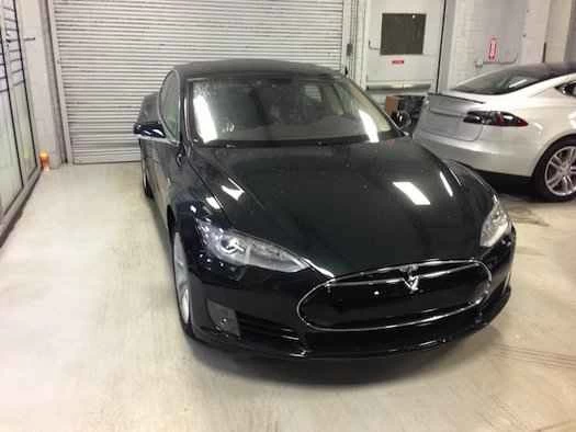 https://www.popsci.comsitespopsci.comfilesimport2013importPopSciArticles2013-tesla-model-s-in-queens-ny-service-center-awaiting-delivery-to-buyer-david-noland-feb-2013_100417863_l.jpg